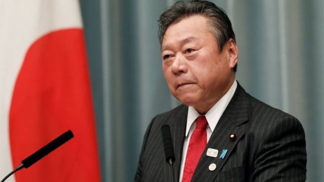 Japan's Yoshitaka Sakurada apologises for being three minutes late